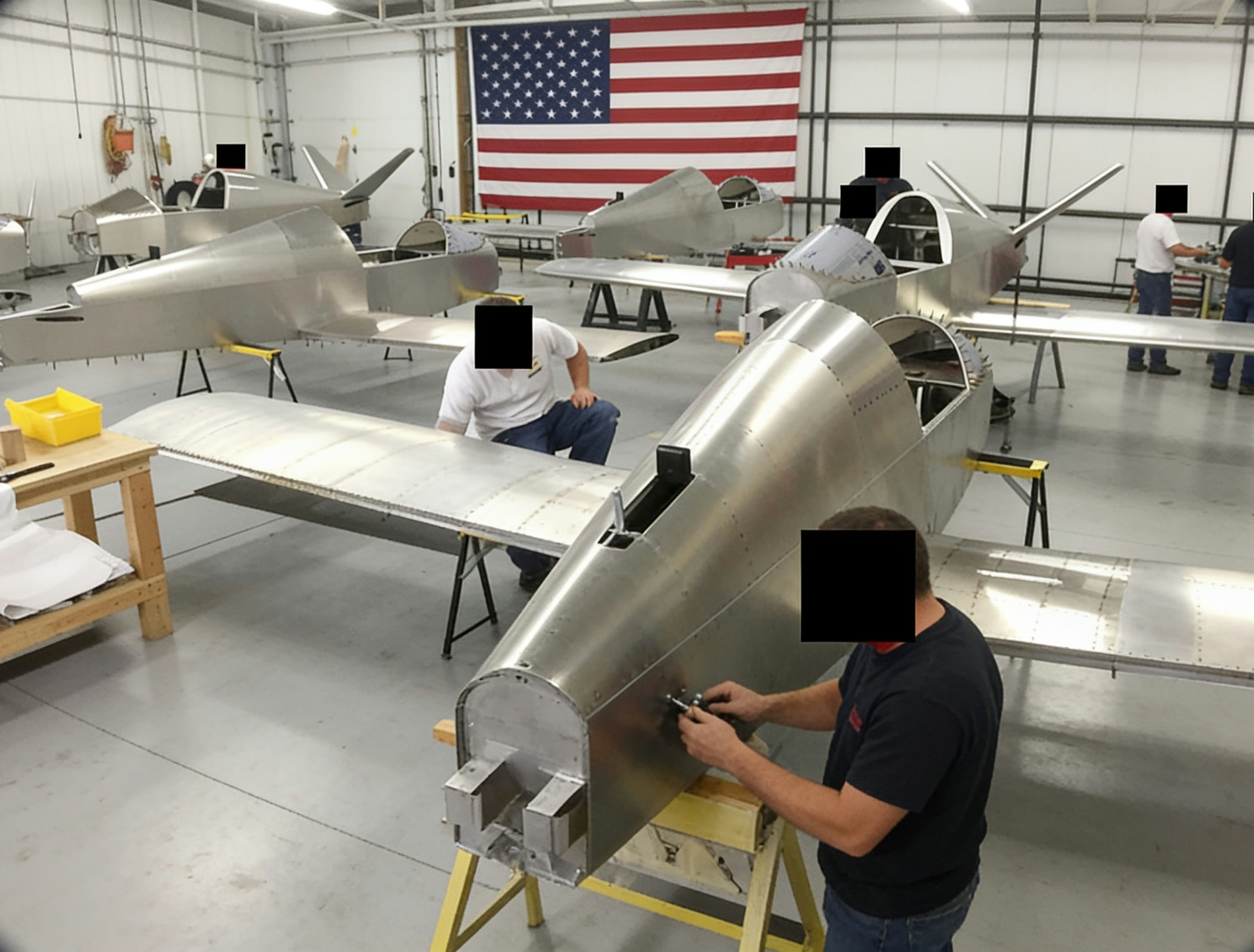 Airframes in assembly beneath the US flag - sovereign domestic production